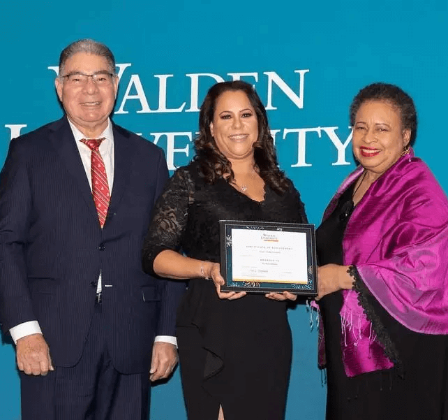 Donna Johnson receiving award.